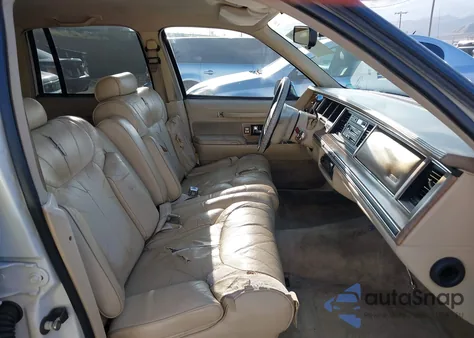 1990 Lincoln Town Car Signature z USA, uszkodzony, nr VIN 1LNCM82FXLY753182